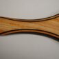 6-7 coats of 100% pure tung oil last 3 coats are sanded on, the last coat with 1500 grit.